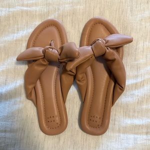 Cute flip flop with bow from Target, never worn.